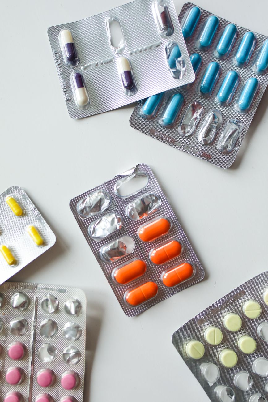 Pharmacist helping a patient at the counter